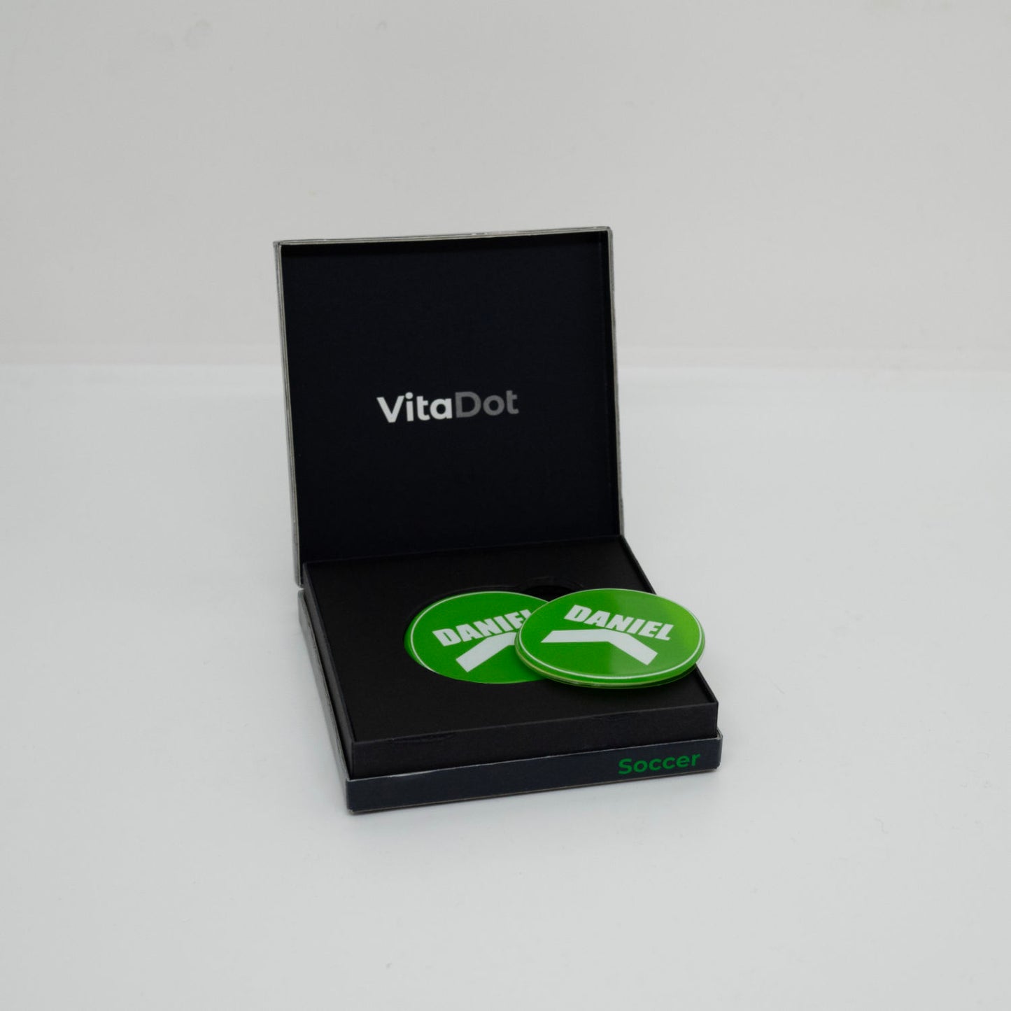 Boîte de présentation VitaDot Soccer avec 5 paires